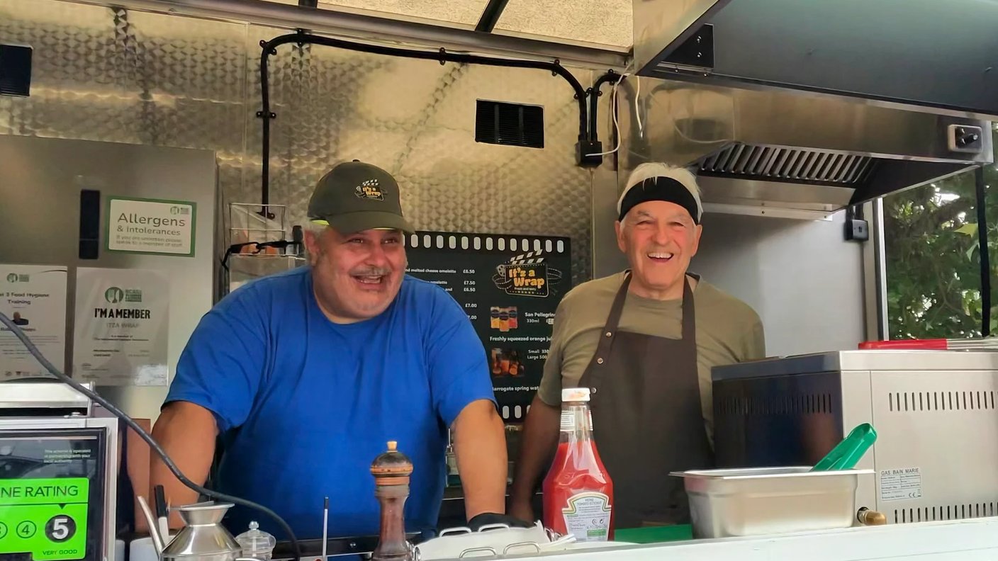Rob and Bruno inside the It’z a Wrap food truck